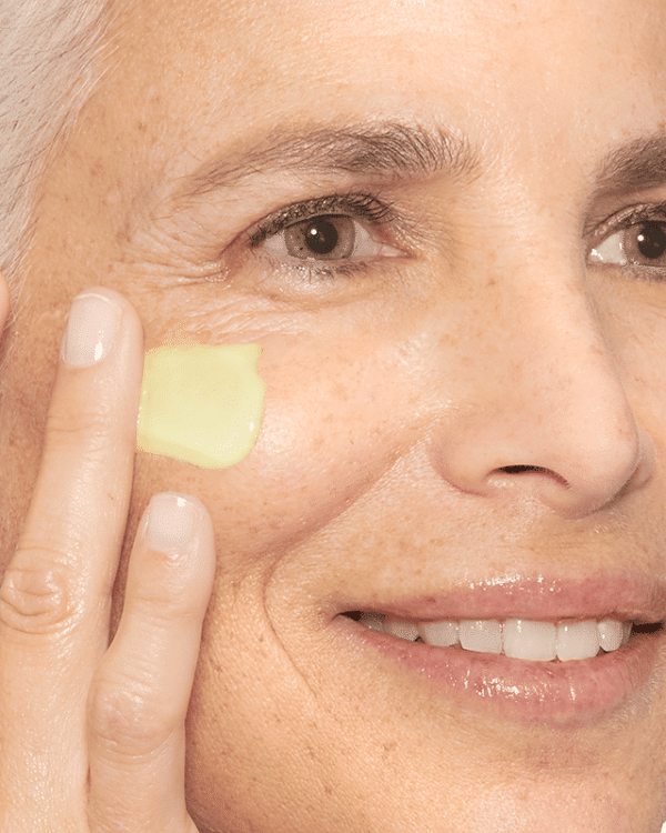 A woman using Dermalogica retinol cream